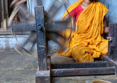 A woman is weaving in the dark at Rajgram, Bankura © Copyright Apratim Saha. All rights reserved.