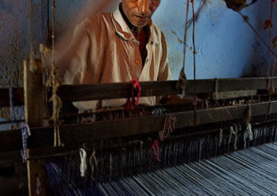An old man weaving at Raj Gram, Bankura, India © Copyright Apratim Saha. All rights reserved.