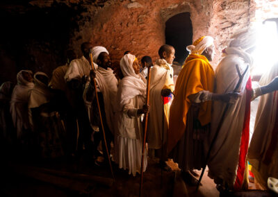 Pilgrims have to walk through very narrow dark tunnels and trench to enter the Church of Saint George in Lalibela, Ethiopia.