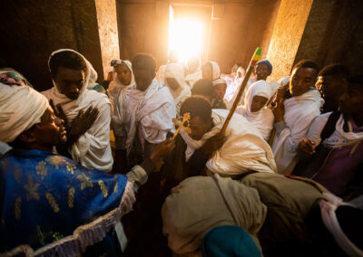 Priest, Megose, of the Saint George Church, Lalibela, is blessing the pilgrims during “Genna (Ethiopian Christmas)”.