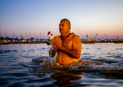 A Sadhu taking a holy dip in Kumbh Mela