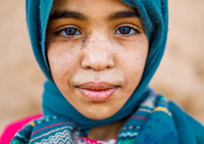 Portrait of a young Berber girl at Tafraout Sidi Ali, a small remote village in Morocco.
