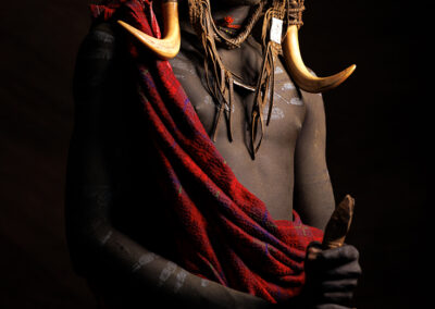 Portrait of a Mursi tribal man from Omo Valley, Ethiopia.