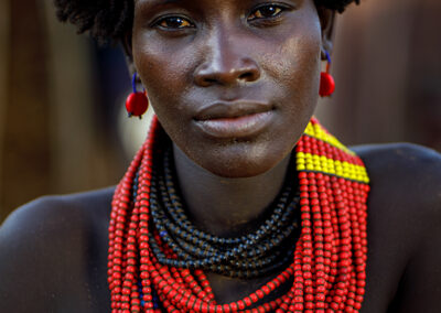 A Daasanach lady sitting infront of her house in the Omo Valley, Ethiopia.