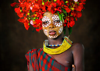 Portrait of a young Suri tribe girl from Omo Valley, Ethiopia.